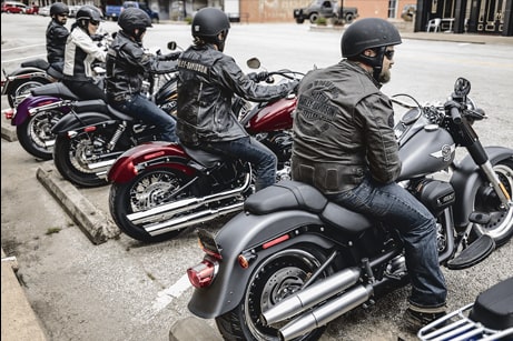 Group of people sitting on H-D motorcycles