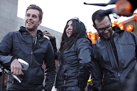 group of people wearing H-D leather jackets