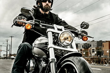 male riding h-d motorcycle